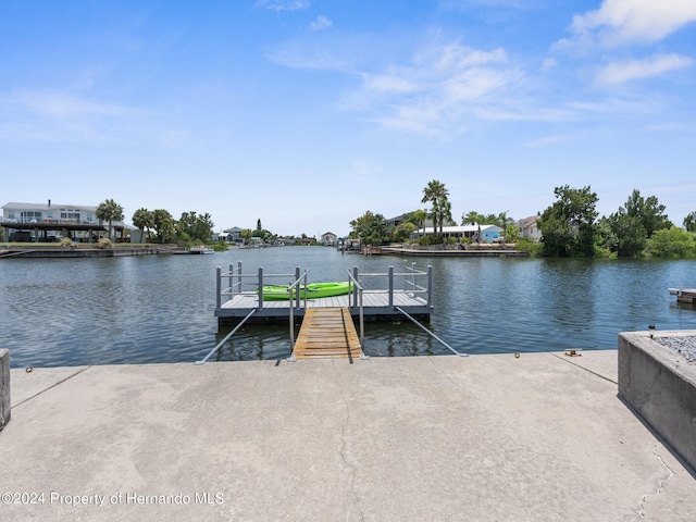 view of dock with a water view