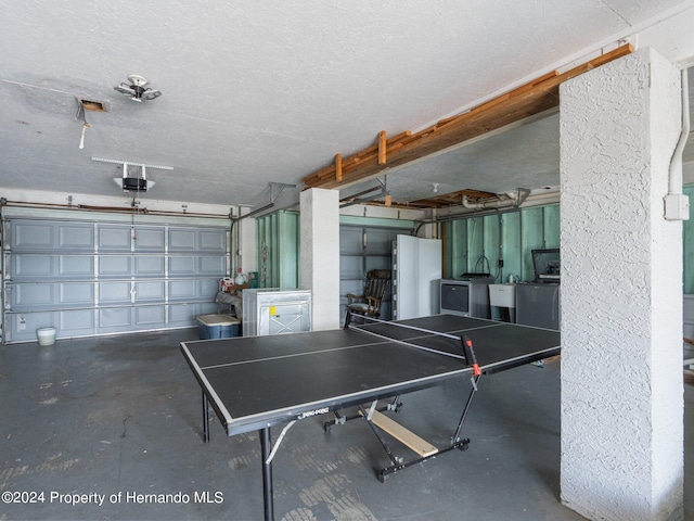 playroom featuring washer / clothes dryer