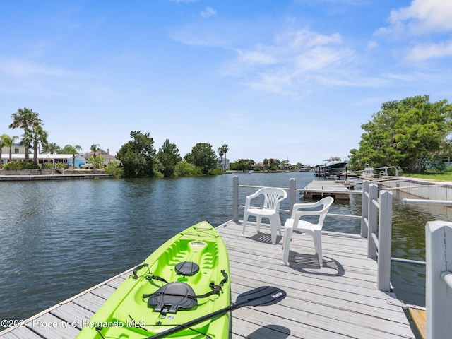 view of dock with a water view