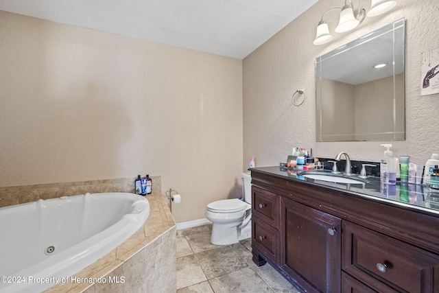 bathroom featuring toilet, vanity, and tiled tub