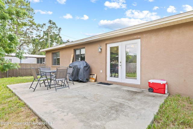 view of patio featuring area for grilling and french doors