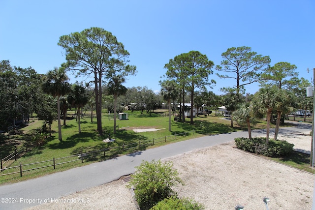 view of home's community featuring a yard