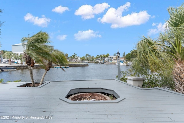 view of dock with a water view