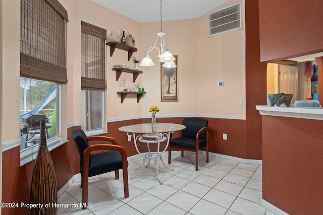 dining area with light tile patterned floors