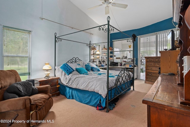 bedroom with high vaulted ceiling, ceiling fan, and carpet floors