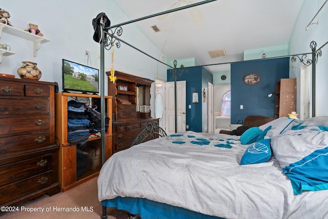 carpeted bedroom with ensuite bathroom