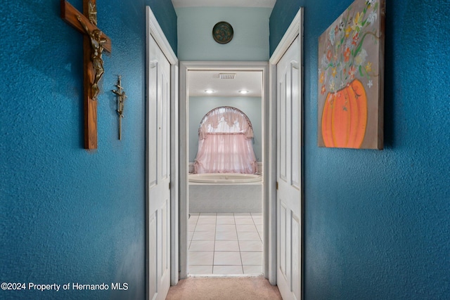 corridor featuring tile patterned floors