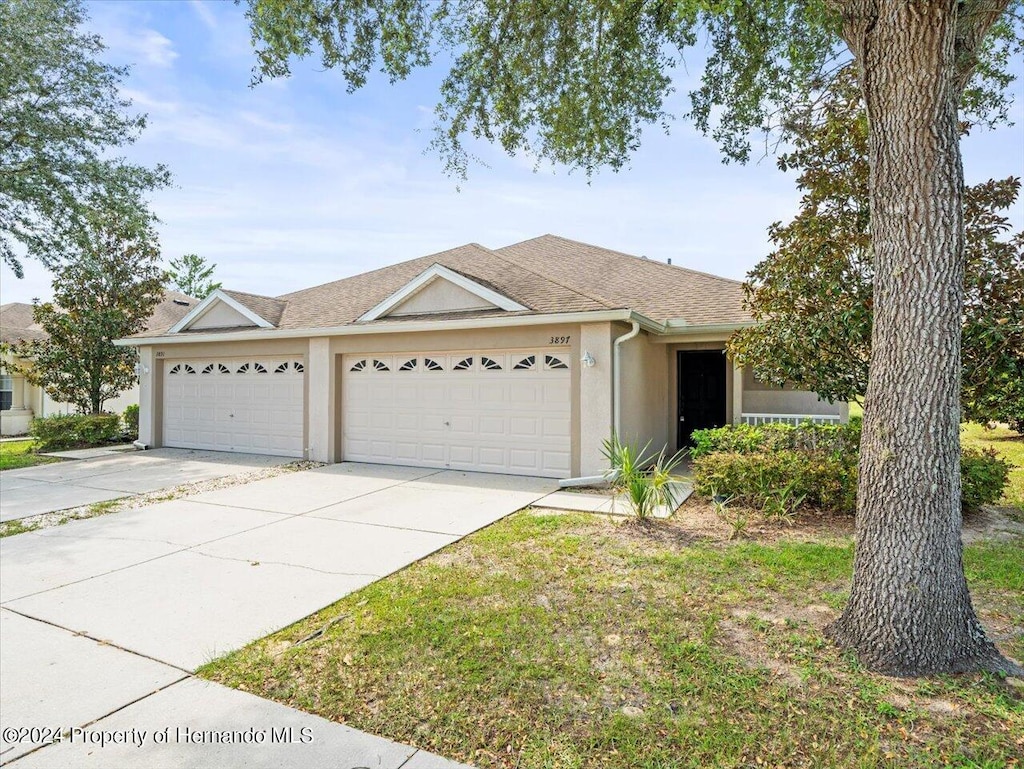 ranch-style house with a garage