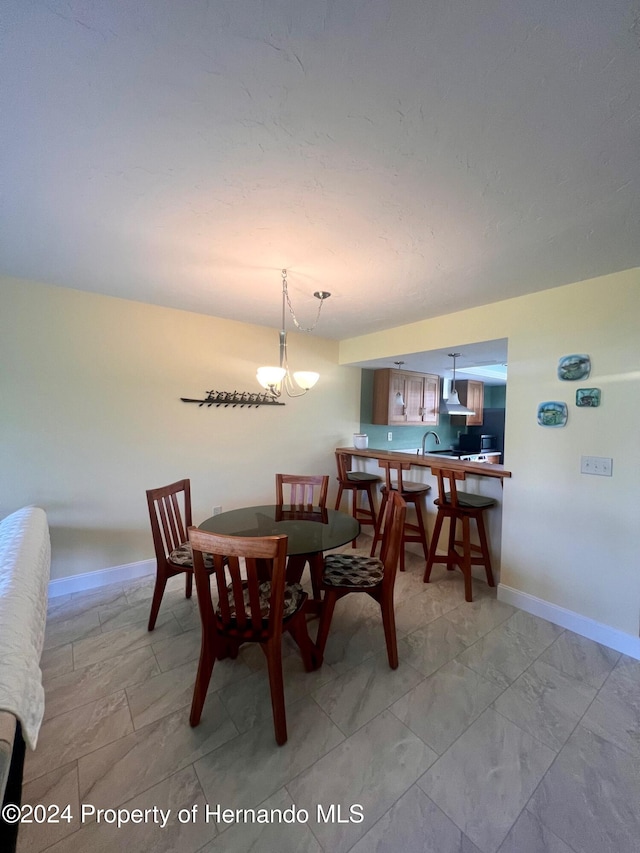 dining space with sink