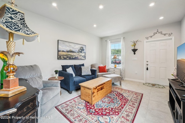 living room with light tile patterned floors