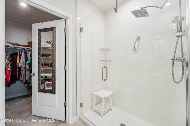 bathroom featuring an enclosed shower