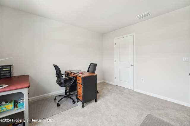 view of carpeted home office