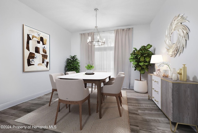 dining room featuring a chandelier and dark hardwood / wood-style floors