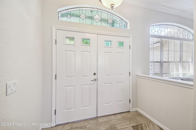 entrance foyer with ornamental molding