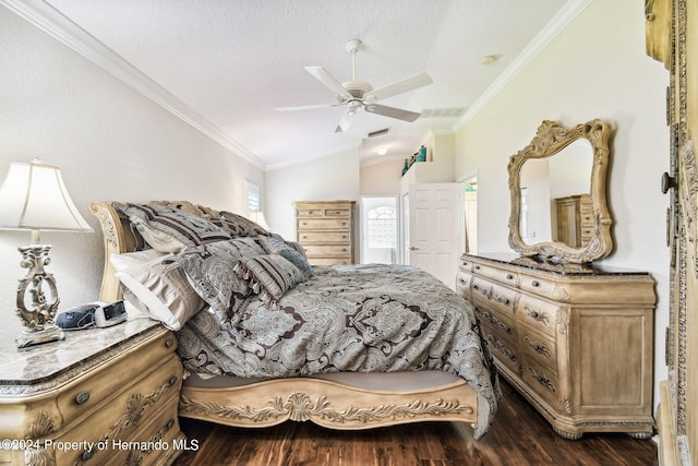 bedroom with dark wood-type flooring, lofted ceiling, ceiling fan, and crown molding