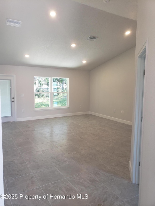 unfurnished room featuring recessed lighting, tile patterned flooring, visible vents, and baseboards