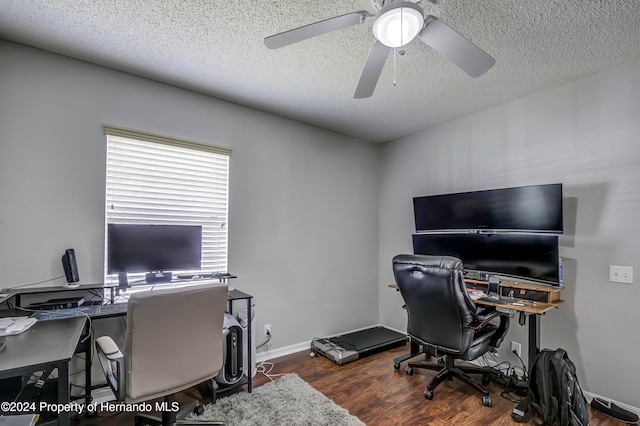 office with a textured ceiling, dark wood-type flooring, and ceiling fan