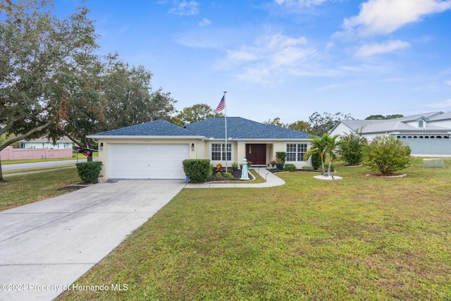 ranch-style house with a front lawn and a garage