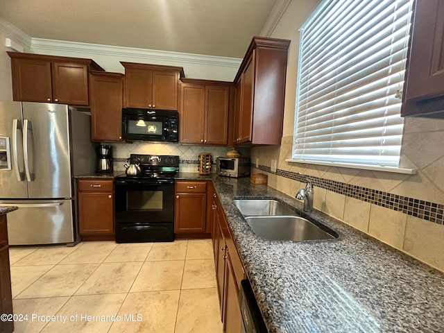 kitchen with black appliances, tasteful backsplash, crown molding, light tile patterned floors, and sink