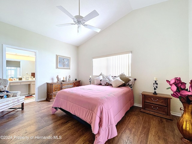 bedroom with dark hardwood / wood-style flooring, multiple windows, and lofted ceiling