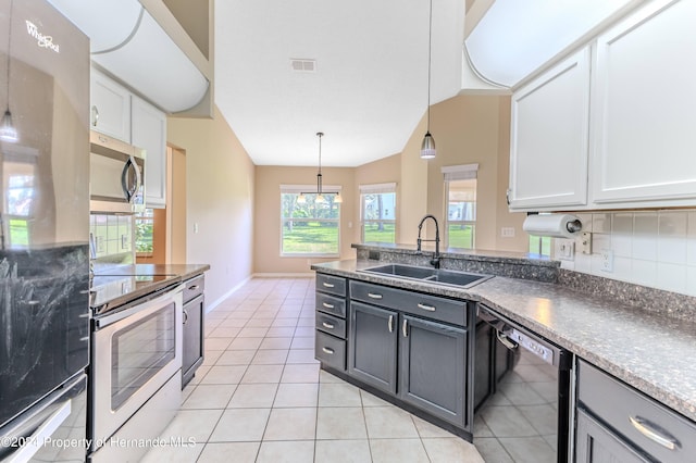 kitchen with electric stove, white cabinets, dishwasher, refrigerator, and sink