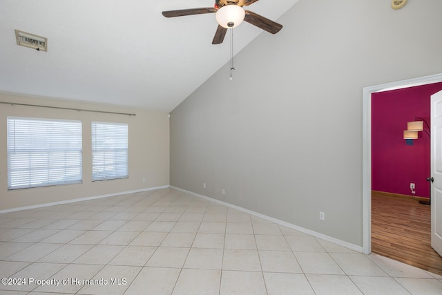 spare room with high vaulted ceiling, light hardwood / wood-style flooring, and ceiling fan