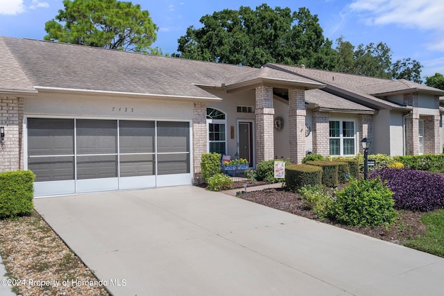 ranch-style house with a garage