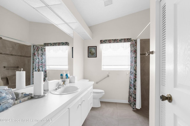 8016 Bellevista Ct, Spring Hill, FL 34606 - full bath with toilet, vanity, a closet, a shower with shower curtain, and marble look tiles