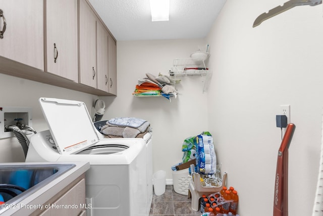 8016 Bellevista Ct, Spring Hill, FL 34606 - laundry room with cabinet space, washer and dryer, and a textured ceiling