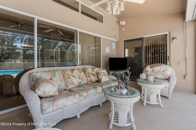8016 Bellevista Ct, Spring Hill, FL 34606 - living room featuring carpet