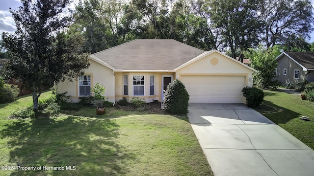 3472 Hartley Rd, Spring Hill, FL 34606 - ranch-style home featuring a garage, stucco siding, concrete driveway, a front lawn, and a shingled roof