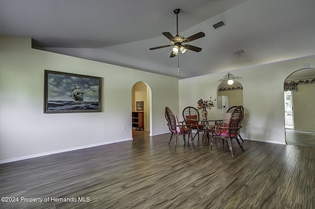 3472 Hartley Rd, Spring Hill, FL 34606 - dining area featuring arched walkways, wood finished floors, lofted ceiling, a ceiling fan, and baseboards