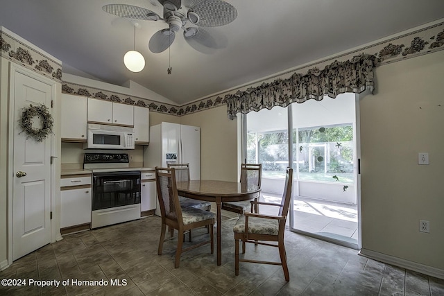 3472 Hartley Rd, Spring Hill, FL 34606 - kitchen with white appliances, ceiling fan, white cabinetry, lofted ceiling, and light countertops