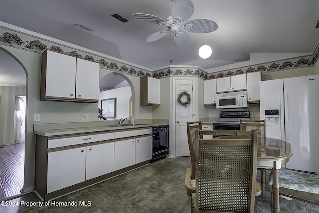 3472 Hartley Rd, Spring Hill, FL 34606 - kitchen featuring white appliances, a ceiling fan, white cabinetry, arched walkways, and lofted ceiling