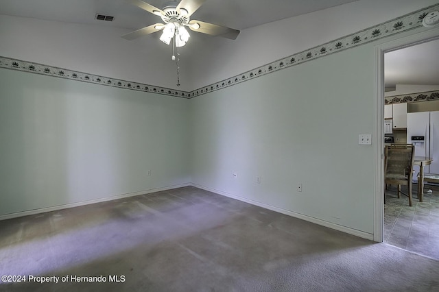 3472 Hartley Rd, Spring Hill, FL 34606 - carpeted spare room with ceiling fan, lofted ceiling, and baseboards
