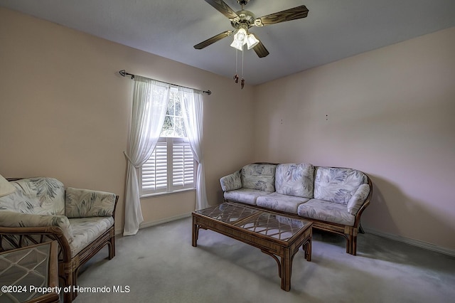 3472 Hartley Rd, Spring Hill, FL 34606 - sitting room with light colored carpet, baseboards, and a ceiling fan