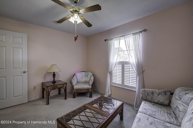3472 Hartley Rd, Spring Hill, FL 34606 - sitting room featuring carpet, a ceiling fan, and baseboards
