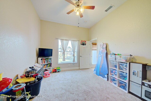 rec room featuring carpet and ceiling fan