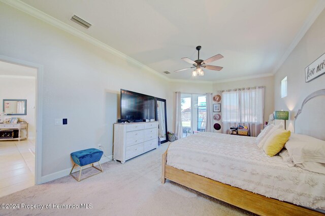 bedroom with ceiling fan, crown molding, and light colored carpet