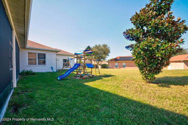 view of yard with a playground