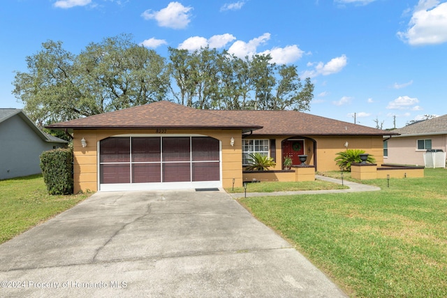 8227 Rhanbuoy Rd, Spring Hill, FL 34606 - single story home featuring driveway, a garage, a front lawn, and a shingled roof