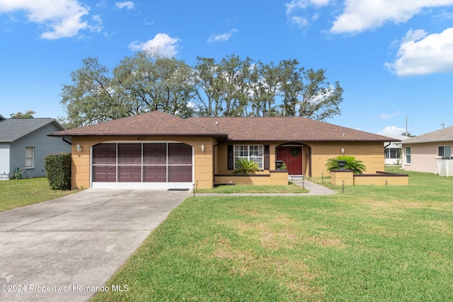 8227 Rhanbuoy Rd, Spring Hill, FL 34606 - ranch-style home with a garage, driveway, a front lawn, and roof with shingles