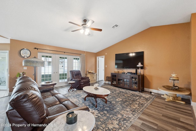 8227 Rhanbuoy Rd, Spring Hill, FL 34606 - living area featuring a ceiling fan, french doors, lofted ceiling, and wood finished floors