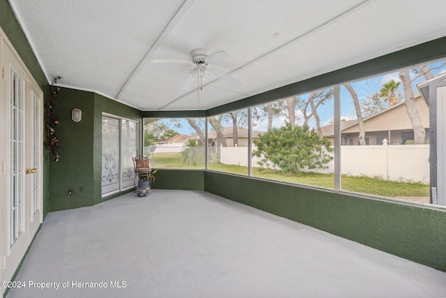 8227 Rhanbuoy Rd, Spring Hill, FL 34606 - unfurnished sunroom with a ceiling fan and french doors