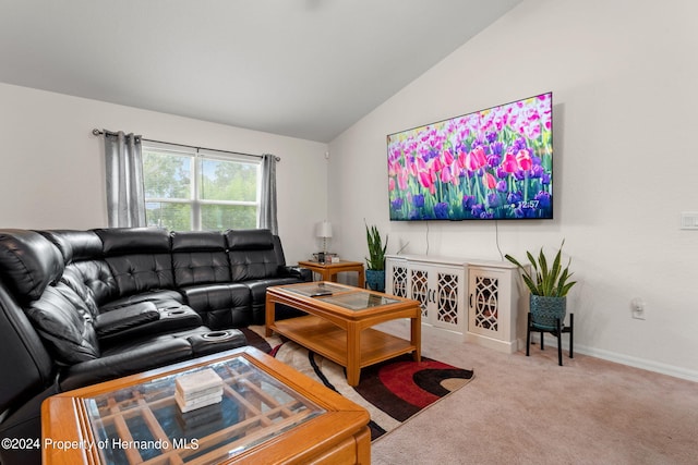 living room with carpet flooring and lofted ceiling