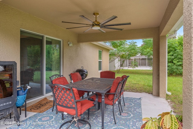 view of patio / terrace featuring grilling area and ceiling fan