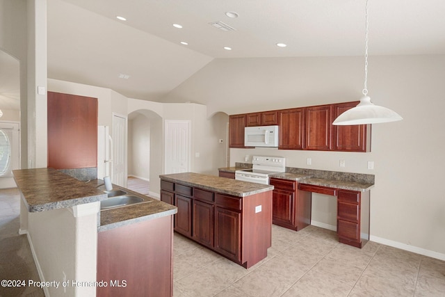 kitchen with light tile patterned flooring, high vaulted ceiling, white appliances, a center island, and pendant lighting