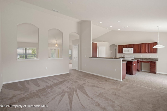 unfurnished living room featuring high vaulted ceiling and light colored carpet