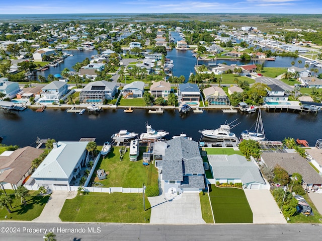 drone / aerial view with a water view