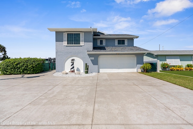 front of property featuring a garage